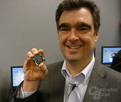 Intel Vice President Steve Smith shows 32nm Westmere microprocessor.