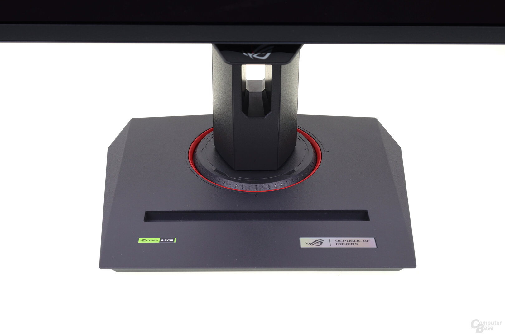 Standfuß des Asus XG27UCDMG mit Kerbe für das Smartphone