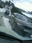 bmw-1-series-with-snow-chains-on-front-wheels-staffordshire-england-dec-2010-photo-by-andy-smith.jpg