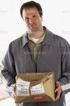 depositphotos_52040205-Man-holding-crushed-package-marked-Fragile.jpg